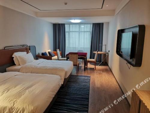 Gallery image of Echarm Hotel Qianjiang Art College in Sanjiang