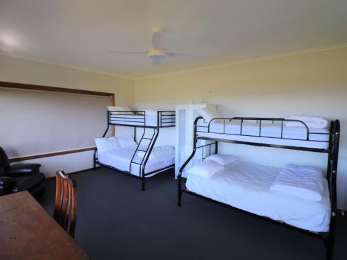 Ένα ή περισσότερα κρεβάτια σε δωμάτιο στο Chez Belle Vue