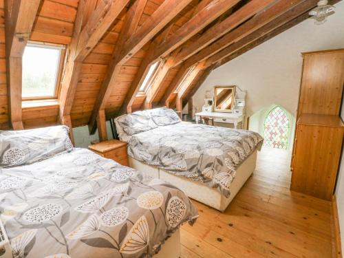 Postel nebo postele na pokoji v ubytování Church Llygad Y Dyffryn