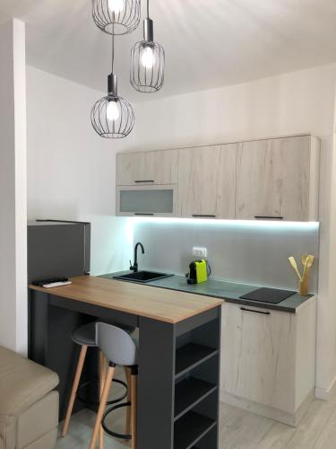 Kuchyň nebo kuchyňský kout v ubytování M&M apartments