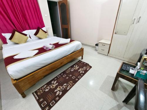 Una cama o camas en una habitación de Hotel Bay Beach Inn