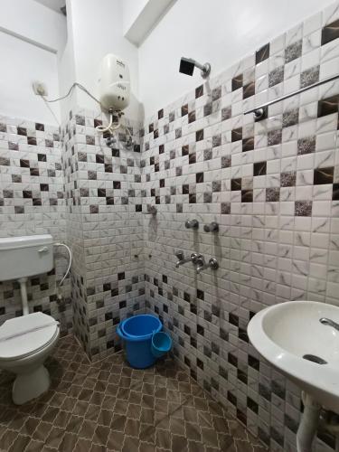 Un baño de Hotel Bay Beach Inn