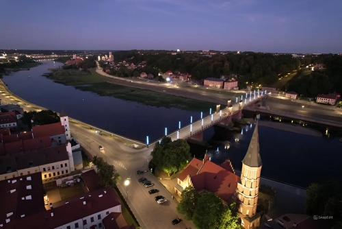 an aerial view of a city with a river and a bridge at Old Town - Bajor Studios 2 - Self Check-in and Parking in Kaunas