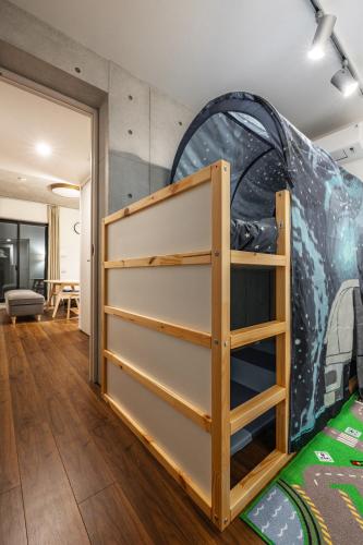 a room with a bunk bed in a room at 67 Apt Kagurazaka Premium in Tokyo