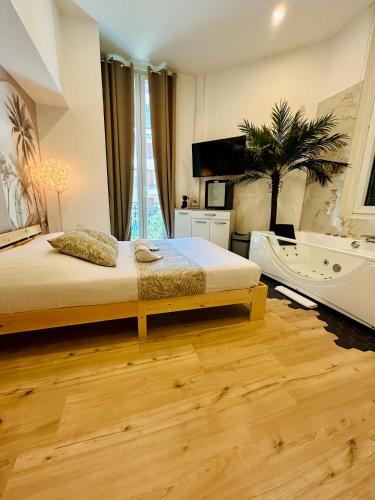 Katil atau katil-katil dalam bilik di Hotel Les Orangers