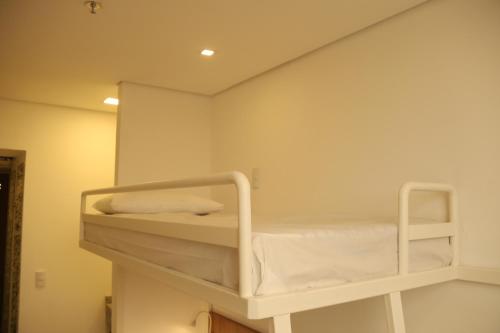 Postel nebo postele na pokoji v ubytování Centro Sul Express Hotel