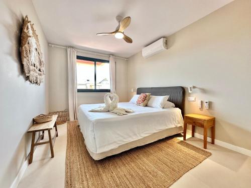 a bedroom with a bed and a window at Paradise Ocean and Volcano View in Playa Paraiso