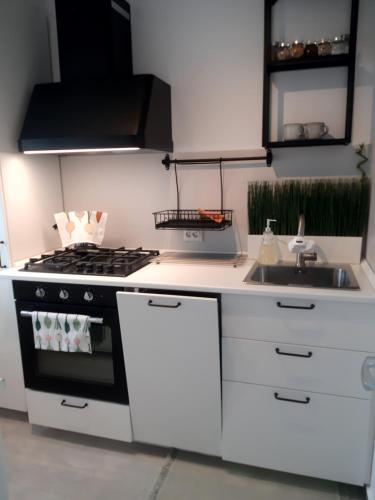 Una cocina o zona de cocina en MIA PLUS!! self check-in!!