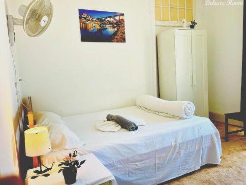 Ένα ή περισσότερα κρεβάτια σε δωμάτιο στο Alfama Guest House