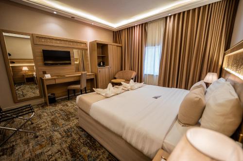 Televisyen dan/atau pusat hiburan di Snood Al Azama Hotel