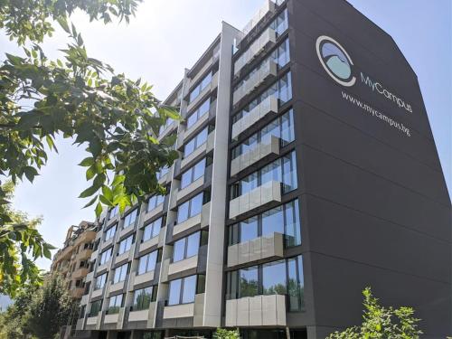 a building with a sign in front of it at My Campus 1 bdrm, Romantic, Panorama view, Free parking, Self check-in in Sofia