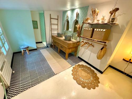 a bathroom with a sink and a mirror at La Bergerie Barbebelle - Piscine - Proche Tourtour - Gorges du Verdon - Lac de Sainte Croix in Villecroze