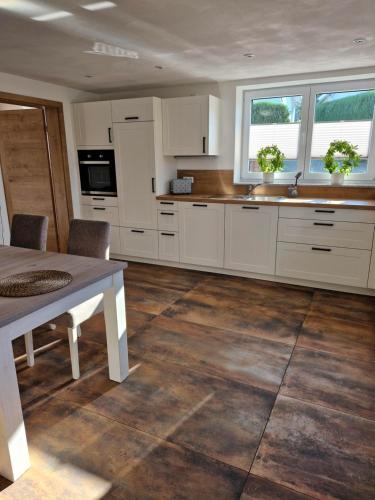 Kuchyň nebo kuchyňský kout v ubytování Ferienwohnung Lauber