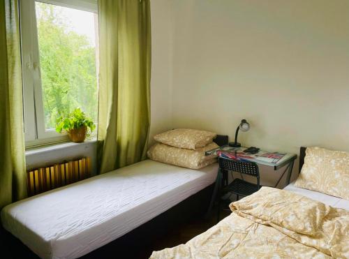 Posteľ alebo postele v izbe v ubytovaní Hostel Tolek