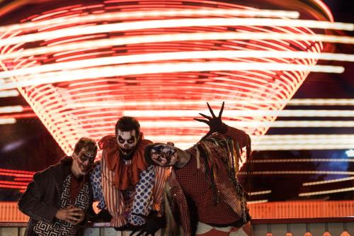 a group of three people dressed up in costumes on a stage at Holiday Inn Express Toronto-North York by IHG in Toronto