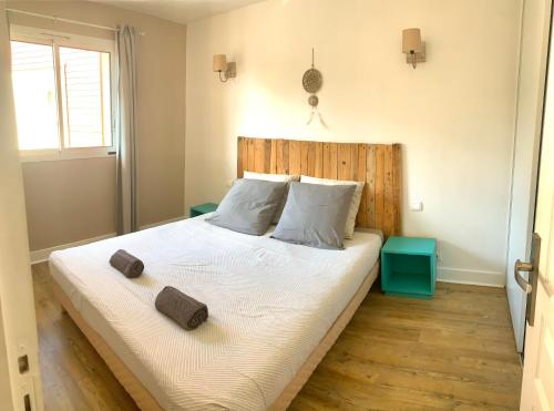 Una cama o camas en una habitación de Cosy Appartement SANNA 3 étoiles piscine, 2 ch