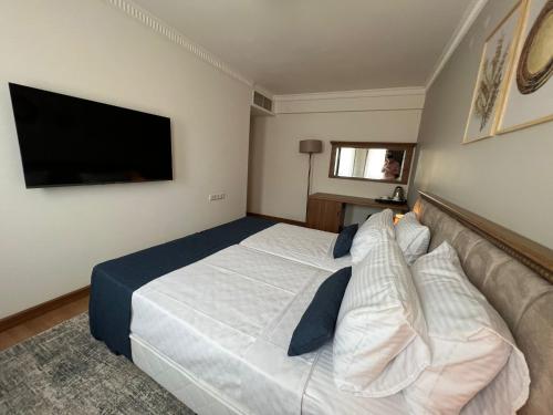 Letto o letti in una camera di İstanblu Hotel&Spa