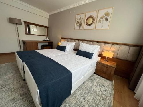 Letto o letti in una camera di İstanblu Hotel&Spa