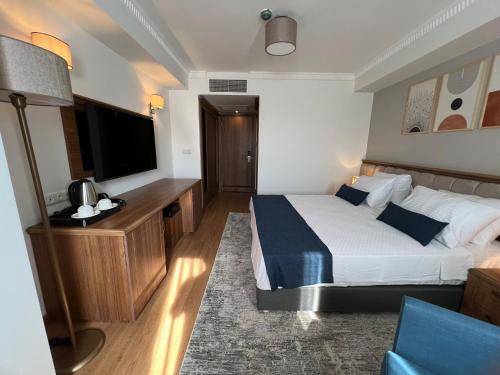 Letto o letti in una camera di İstanblu Hotel&Spa