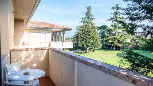 Κήπος έξω από το Residence Venezia Park - ENJOY HOLIDAY