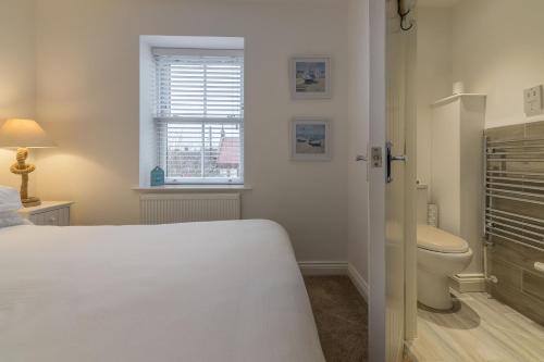 Koupelna v ubytování Blossom Cottage 4