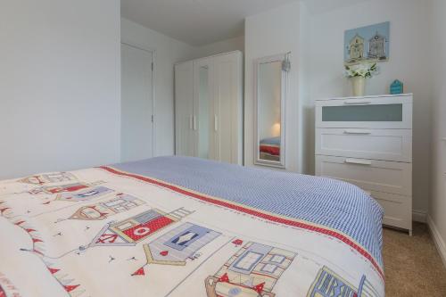 Postel nebo postele na pokoji v ubytování Blossom Cottage 4