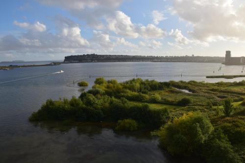 an island in the middle of a body of water at voco St. David's Cardiff by IHG in Cardiff