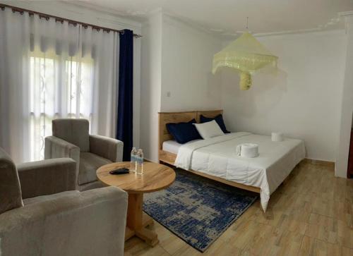 Ένα ή περισσότερα κρεβάτια σε δωμάτιο στο Fun-ville Vacation Home