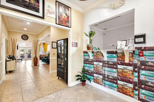 a store with a large display of shoes at Banana Leaf Villa-Marley Junior Suite in Orlando