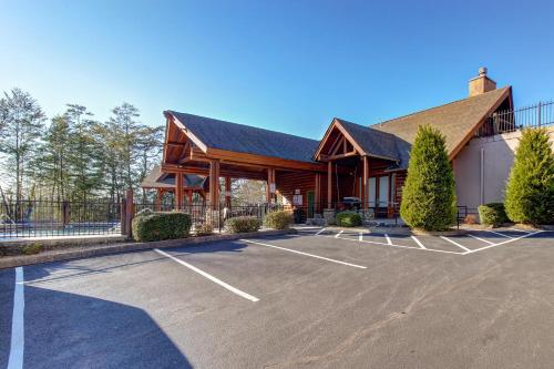 a building with a parking lot in front of it at second wind in Pigeon Forge