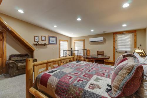 a bedroom with a bed with a quilt on it at second wind in Pigeon Forge