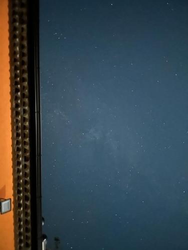 a view of the night sky through a window at BORGO DON ARMANDO - Appartamento A B C E in Francavilla in Sinni