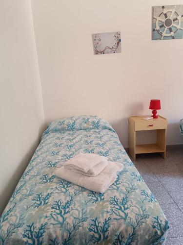 Postel nebo postele na pokoji v ubytování Dal Professore