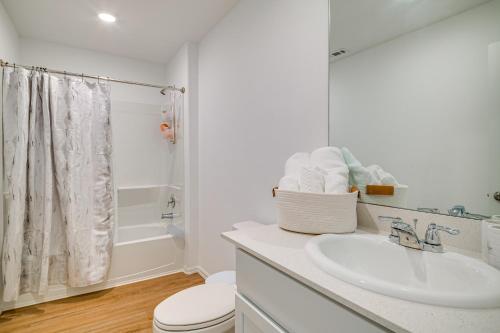 a bathroom with a sink and a toilet and a shower at Pet-Friendly Home about 4 Mi to Big Rivers Water Park! in New Caney