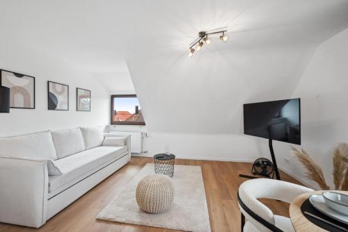 Μια τηλεόραση ή/και κέντρο ψυχαγωγίας στο Malu Rooms - Top Lage, Kostenloser Parkplatz, Klima, Netflix, 24h Checkin