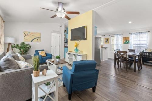 a living room with a couch and a table at 10 Min Drive to the Sequoias in Three Rivers