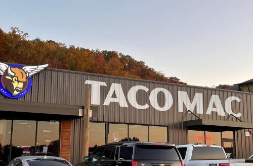 a taco mac store with cars parked in a parking lot at Brand new Apt Oak Mt St Park Lots of Amenities in Pelham