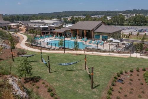 an aerial view of a pool with hammocks in a yard at Near Oak Mt Amphitheatre and Pelham Civic Complex in Pelham