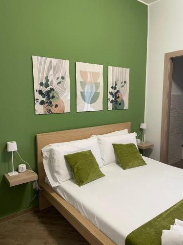 Postel nebo postele na pokoji v ubytování Policlinico Room
