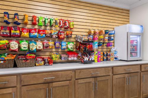 a store with a display of chips and other snacks at Holiday Inn Express Hotel & Suites Live Oak by IHG in Live Oak
