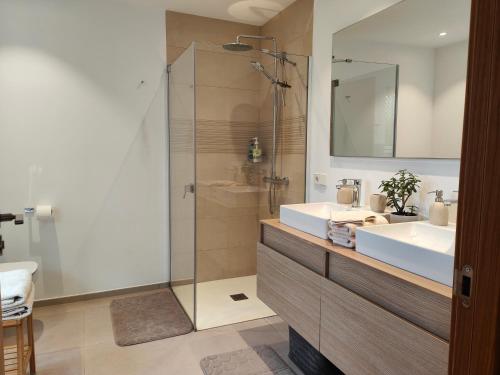 A bathroom at Garden Suites luxury apartment