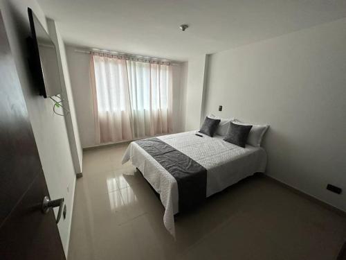Postel nebo postele na pokoji v ubytování Apartamento Nuevo Laureles- La 70