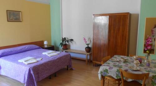 Postel nebo postele na pokoji v ubytování B&B Fenice Barocca