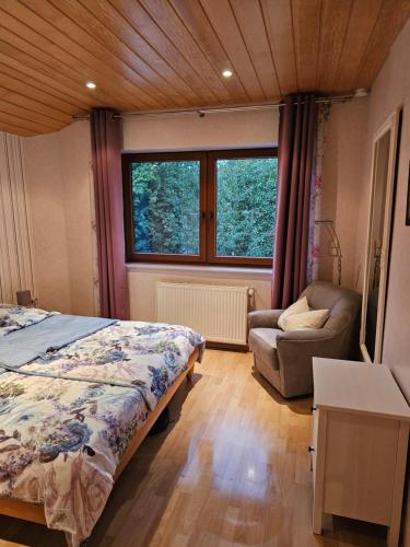 Postel nebo postele na pokoji v ubytování Ferienwohnung Kratzert Gütersloh 1-2 Schlafzimmer