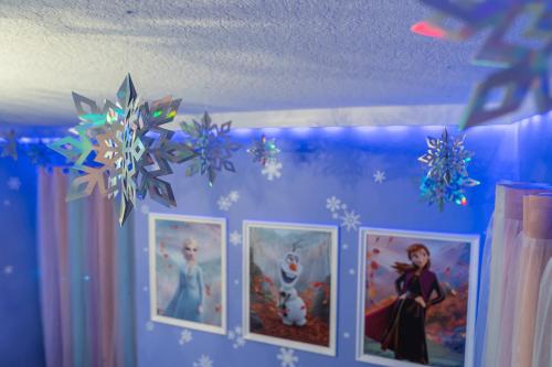 a room with pictures on the wall with snow at Thematic House w PoolSpaGame Room in Resort in Loughman
