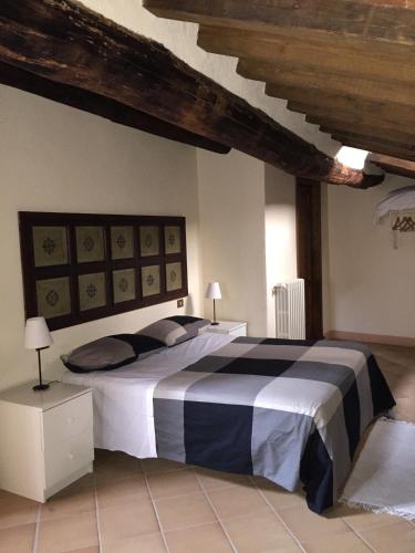 Postel nebo postele na pokoji v ubytování Locanda Petrella