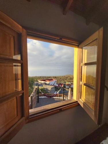 a window in a room with a view of a balcony at VV Las Vistas de El Pinar in El Pinar del Hierro