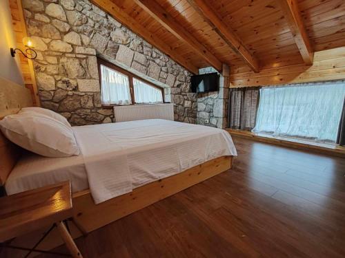 Postel nebo postele na pokoji v ubytování Vila Nikol