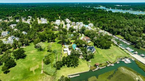 an aerial view of a house on an island in a river at Masons View by Sea Scape Properties in Wrightsville Beach