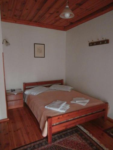 Postel nebo postele na pokoji v ubytování Guesthouse Gouris